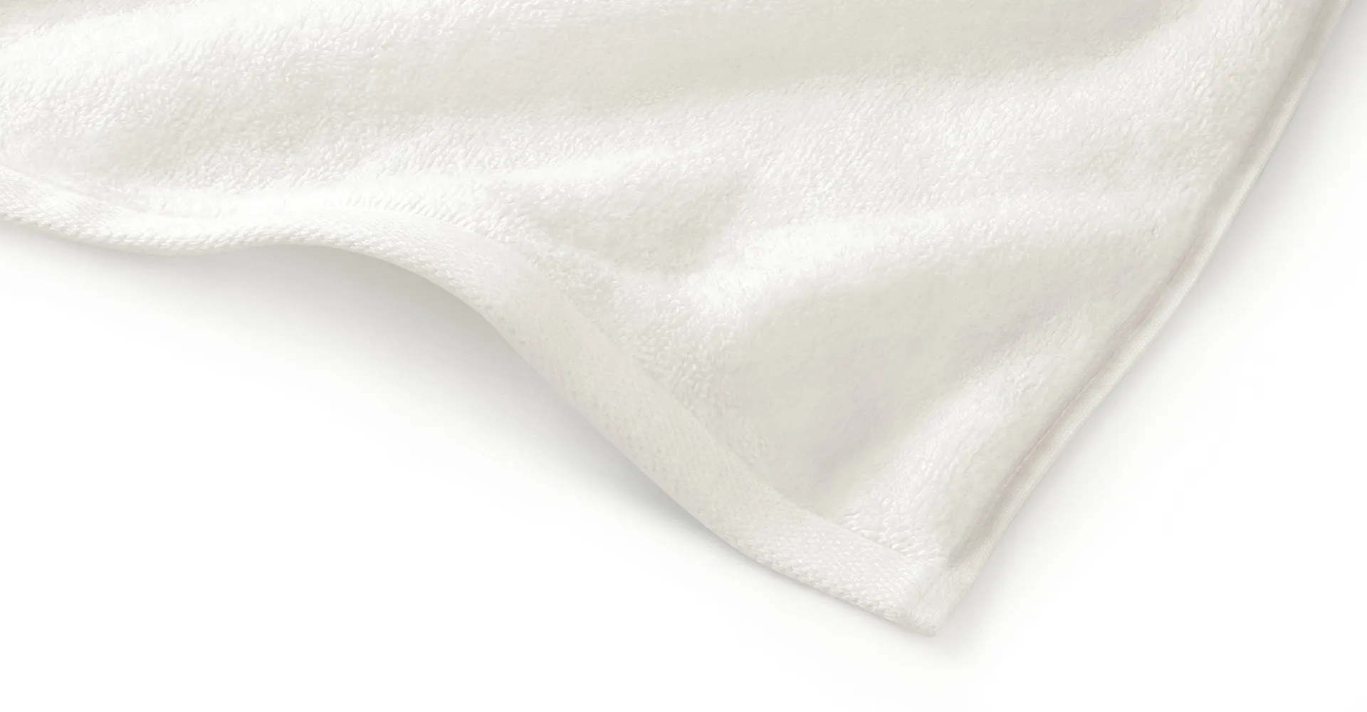 schlossberg-coshmere-gots-frottier-blanc-closeup-1920x1000