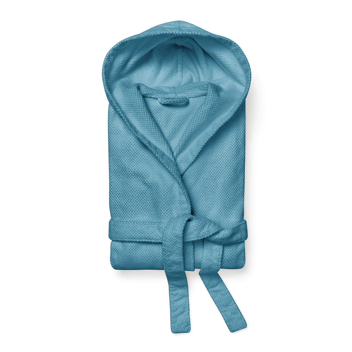 Schlossberg Frotterie Bademantel Nova Ocean Gefaltet Ein gefalteter Schlossberg Frotterie Bademantel Nova in der Farbe Ocean mit Kapuze und Gürtel.