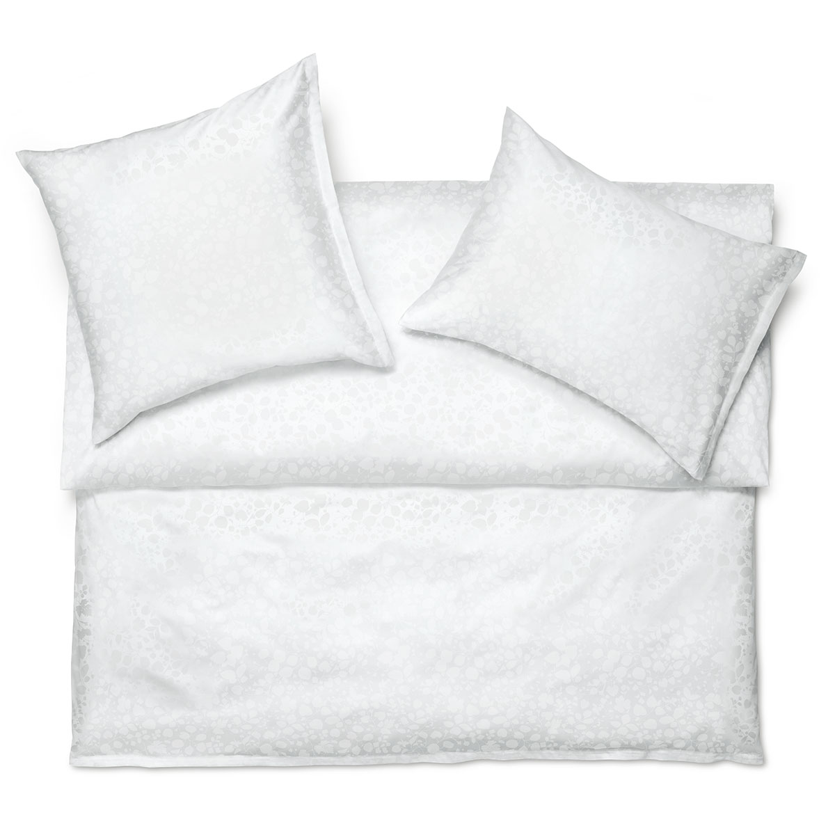 Elegante Bettwäsche Jardin in Weiss Bettwäsche-Set Jardin in reinem Weiss mit dezentem floralen Muster, bestehend aus einem Duvet und zwei Kissen, ideal für ein schlichtes und stilvolles Schlafzimmer.